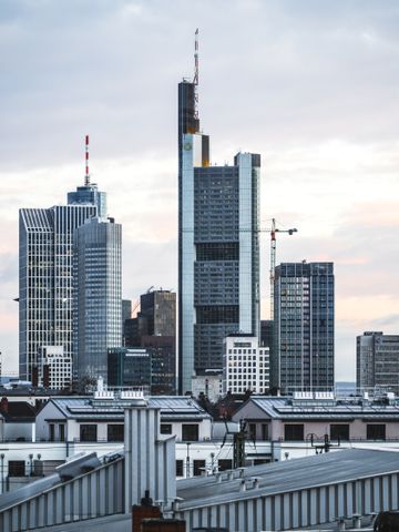 photo of Sunrise colours in Frankfurt am Main with the ​skyline by Paul Fiedler via Unsplash
